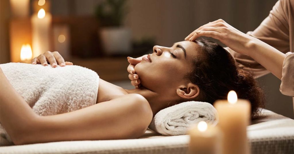 woman getting a massage relaxing without technology